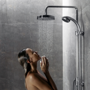 STYLE (4) Black rain shower head against tiled shower walls